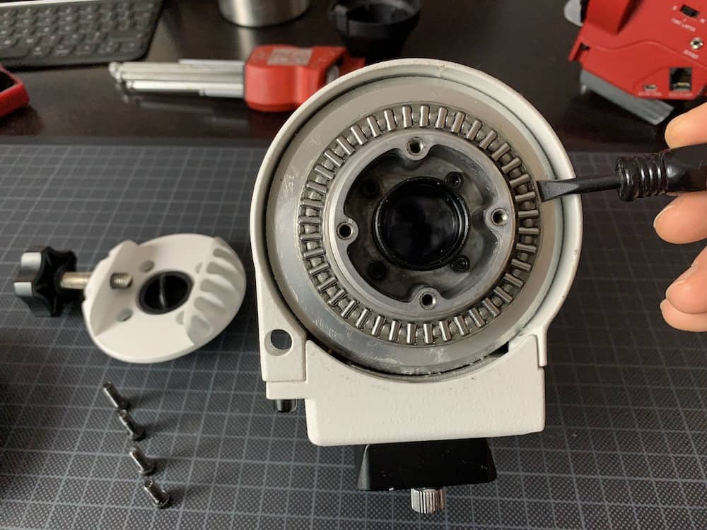 Use a flat screw driver to help you remove the bearings ring