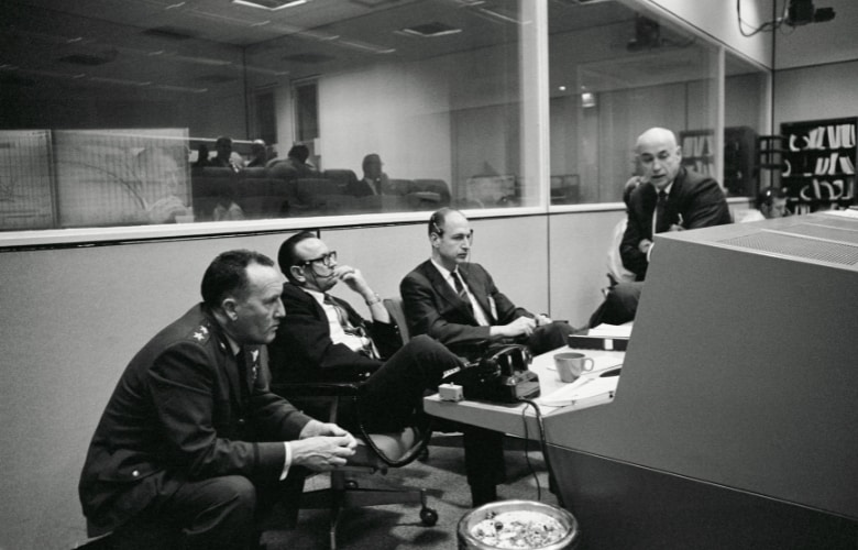 Scene at the Flight Operations Director's console during Apollo 6