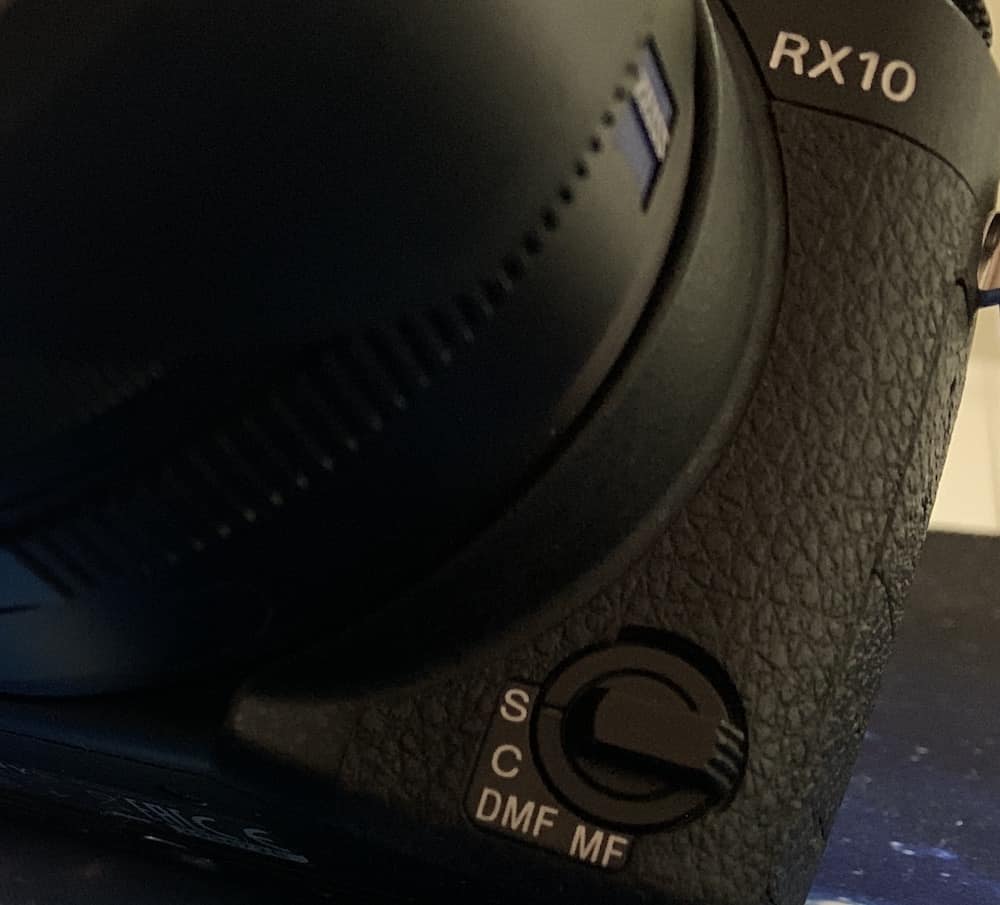 Sony RX10 has a physical selector to quickly switch between different focus modes
