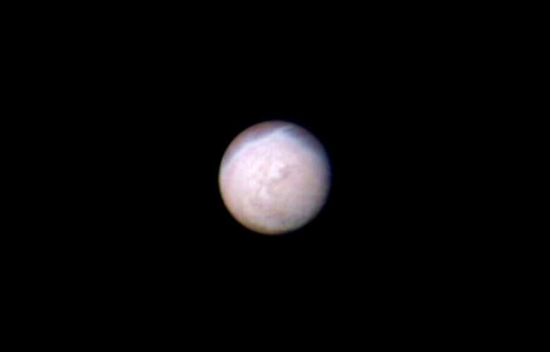 Color image of Neptune's largest satellite, Triton.