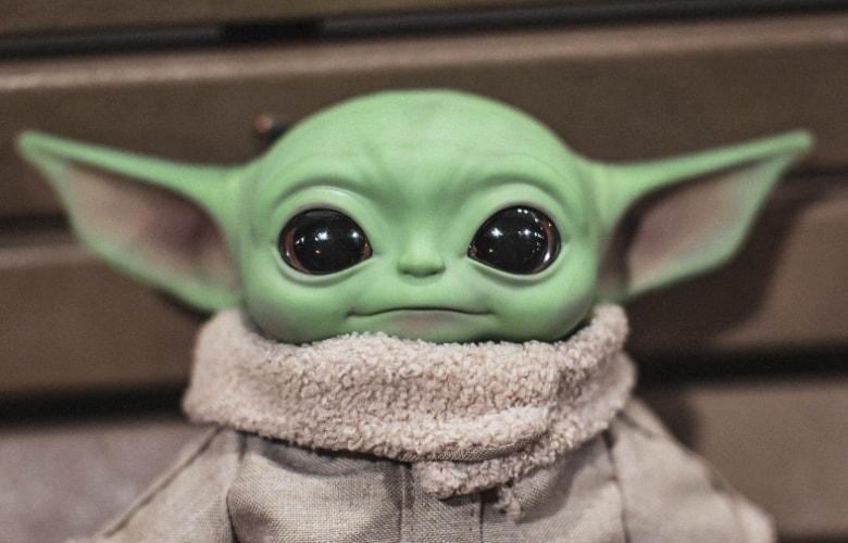 A cute baby Yoda figure