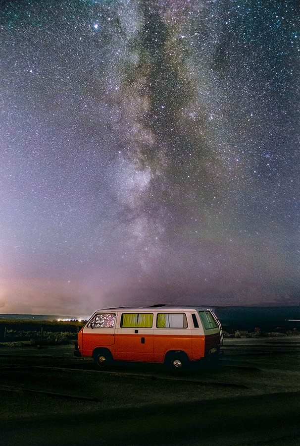 The Milky Way dwarfing an old VW van