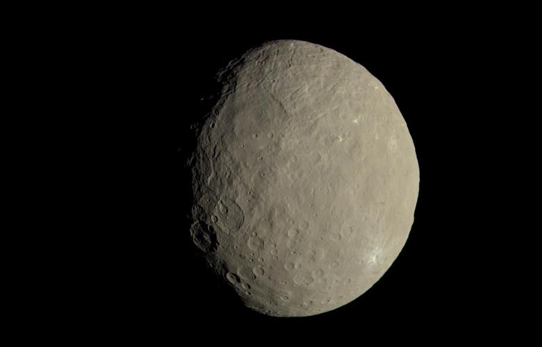 An image of Ceres depicts how the dwarf planet's colors would appear to the naked eye.
