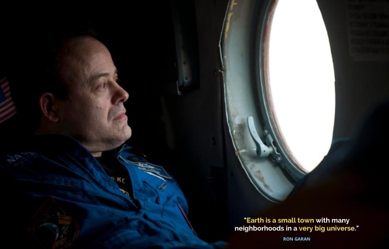 Expedition 28 Flight Engineer Ron Garan looks out the window of his helicopter as it prepares to depart