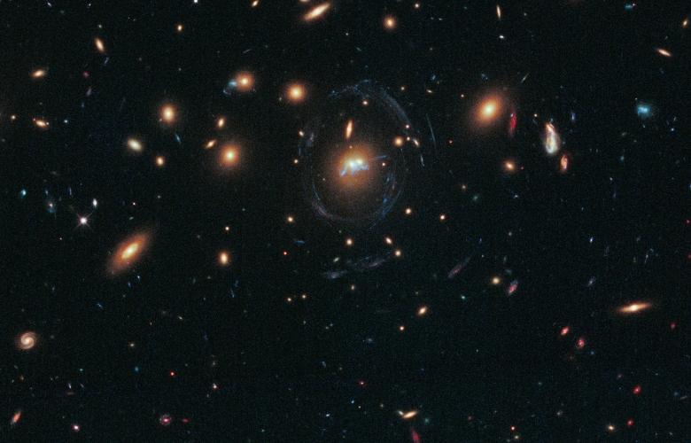 SDSS J1531+3414 is a dense galaxy cluster in the northern constellation Corona Borealis, primarily composed of giant elliptical galaxies with a few spirals and irregular galaxies.