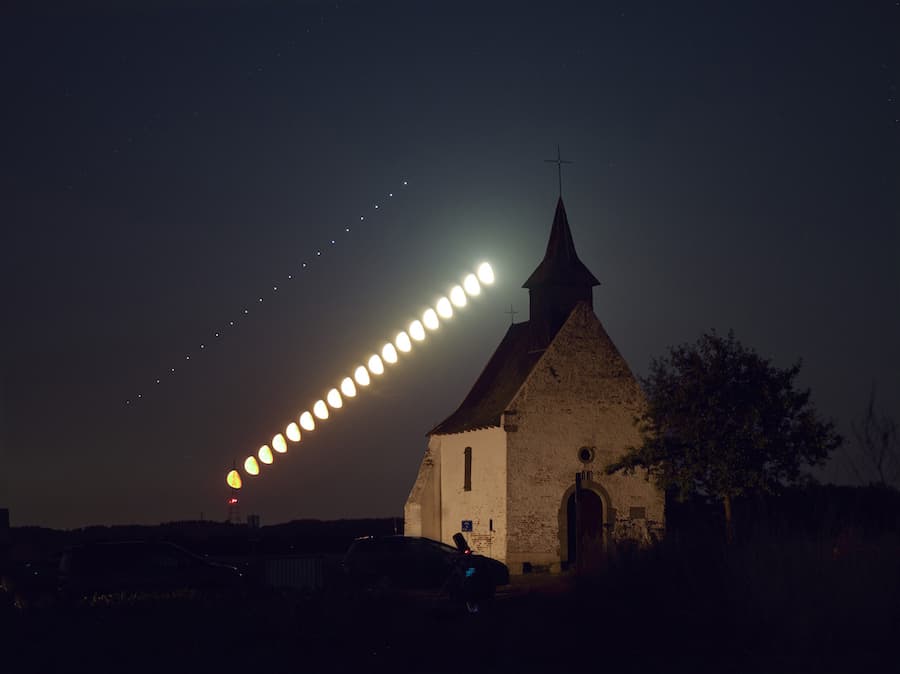 The Moon and Jupiter rising next to the small Chapel in the Belgian countryside